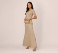 3D Floral Beaded Mermaid Gown With Sheer Short Sleeves In Biscotti